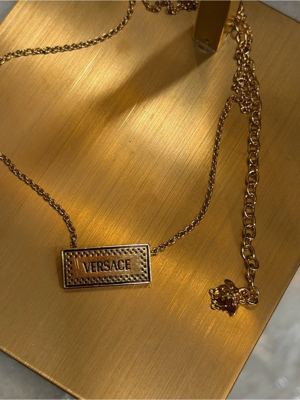 Versace Gold Logo Bar Necklace with Pink Floral Accent